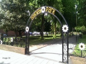 Galvanised and powder coated decorative arch with laser profiled flowers