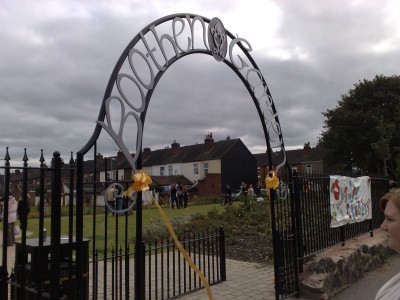 galvanized and polyester powder coated mild steel decorative arch which are compliant to BS 1722 Part 9.