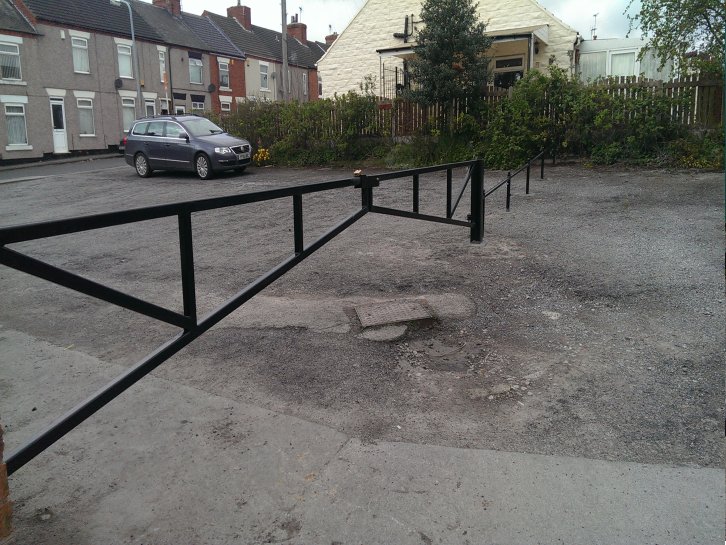 galvanized and powder coated barrier gate to perimeter of working mens club