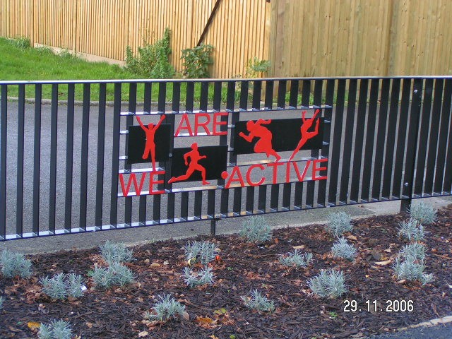 galvanized and polyester powder coated mild steel decorative flat top railings complete with lettering which are complaint to BS 1722 Part 9.