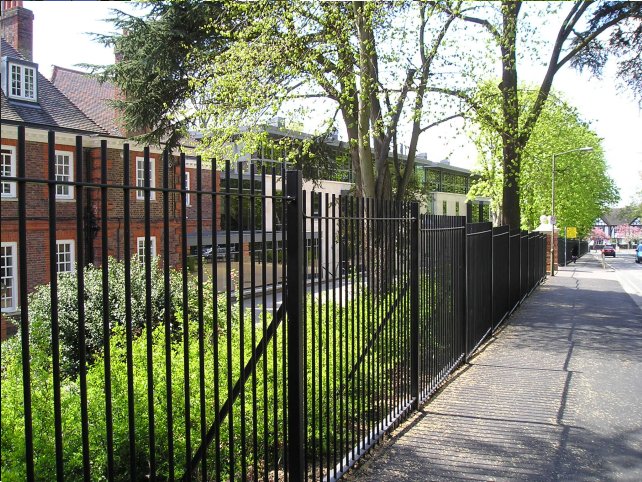 galvanized and powder coated mild steel vertical bar railings and sliding gates to BS 1722 Part 9.