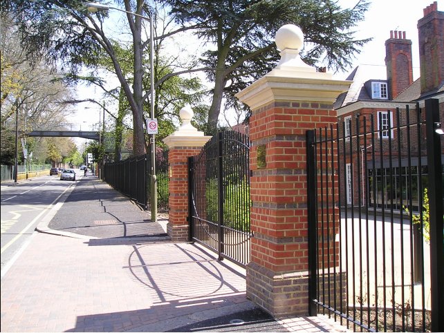 galvanized and powder coated mild steel vertical bar railings and sliding gates to BS 1722 Part 9.