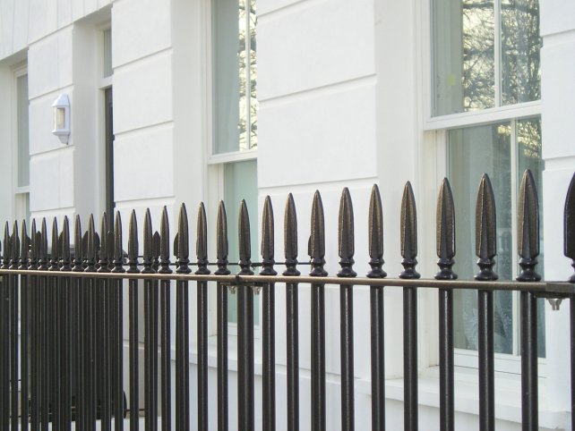 Galvanised and powder coated vertical bar railings with decorative finials