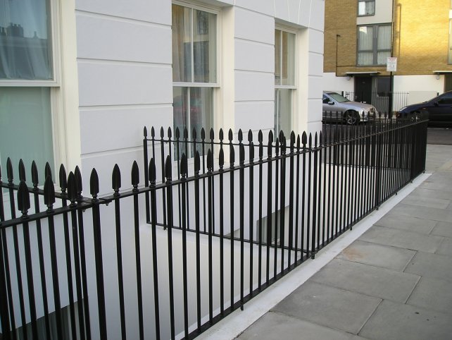 Galvanised and powder coated vertical bar railings with decorative finials