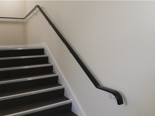 Mild steel handrail for internal stair core