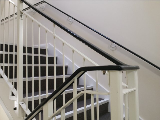 Mild steel handrail for internal stair core