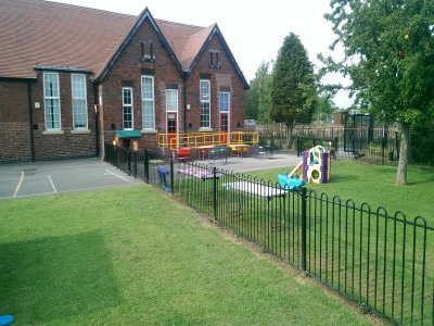 galvanized and powder coated mild steel Playspec Bow Top Railings to primary school