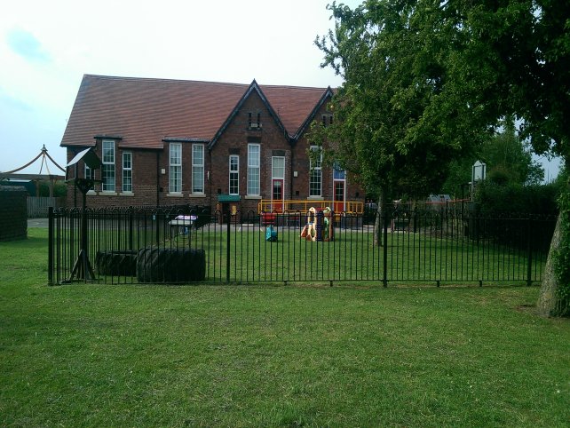 galvanized and powder coated mild steel Playspec Bow Top Railings to primary school