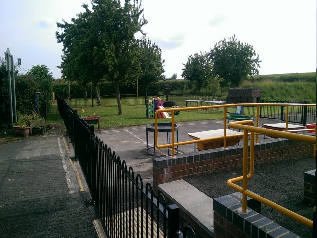 galvanized and powder coated mild steel Playspec@ Bow Top Railings to primary school