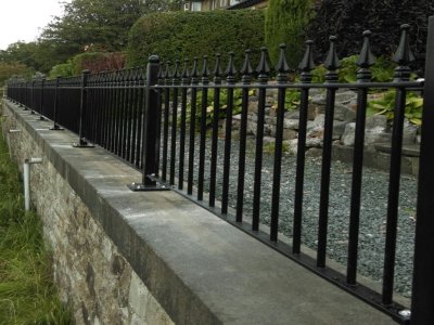 decorative vertical bar railings to front of properties
